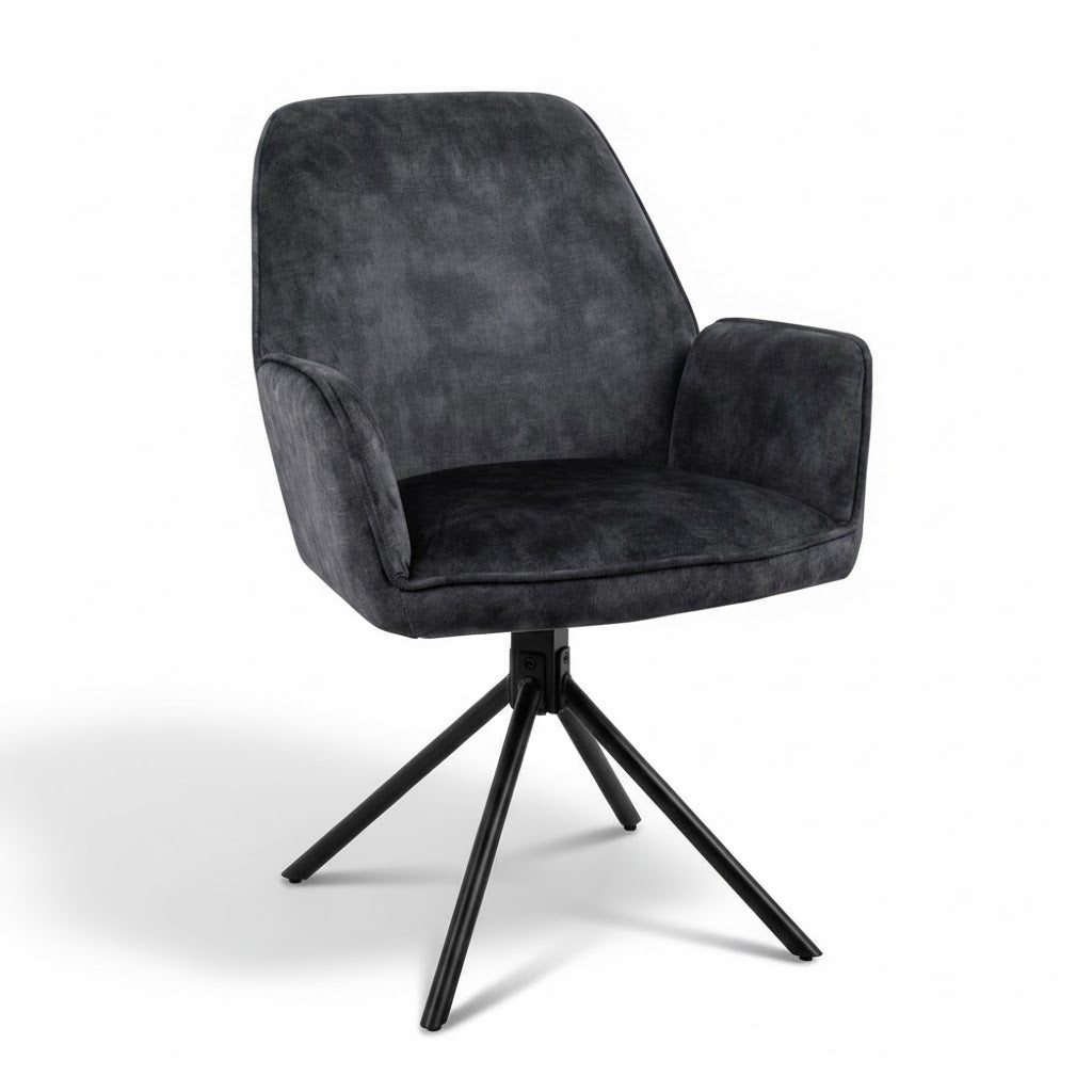 Luxe eetkamerstoel Noah in antraciet velvet van het merk Benoa, voorzien van een stoer zwart metalen onderstel en natuurlijke schaduwval voor een realistisch 3D-effect op een witte achtergrond.